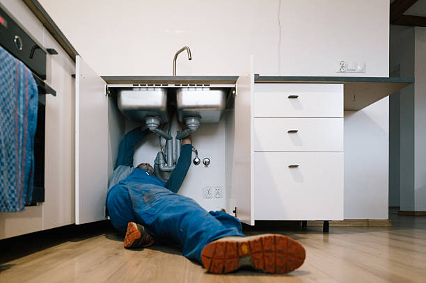 Professional Drain Cleaning technician working in Palm Coast, FL